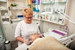 beautician using facial cryotherapy massager in co 2025 03 24 11 27 00 utc